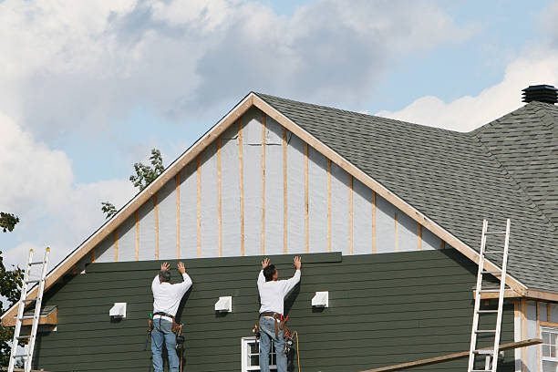 Professional Siding Contractor technician working in Clinton, NC